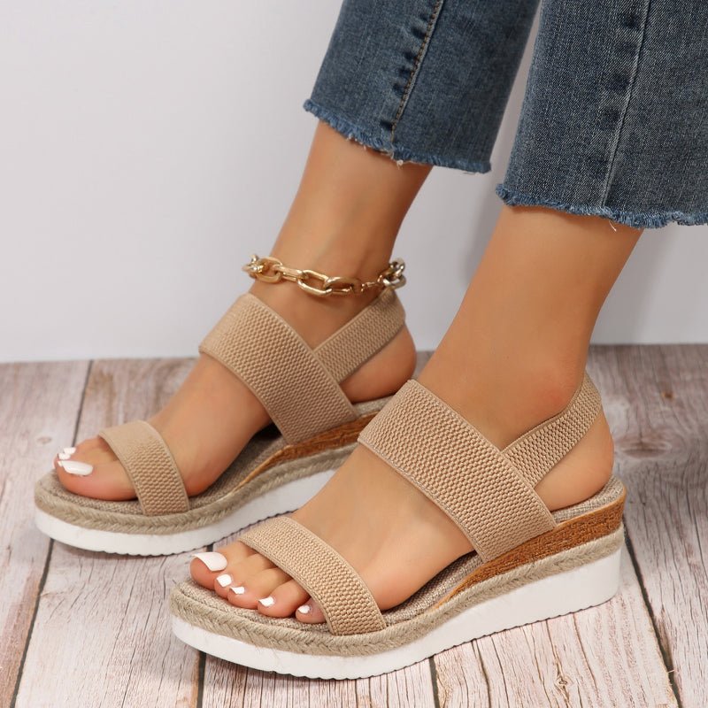Vista lateral de las sandalias deportivas Aloria en color rosa